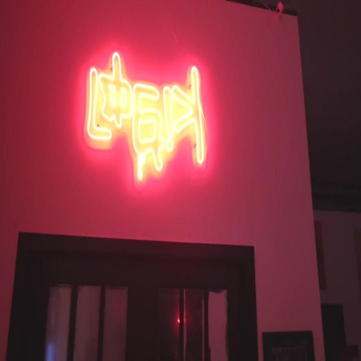 Chicago, 2022: LOGIK's neon tag glowing on a pink wall